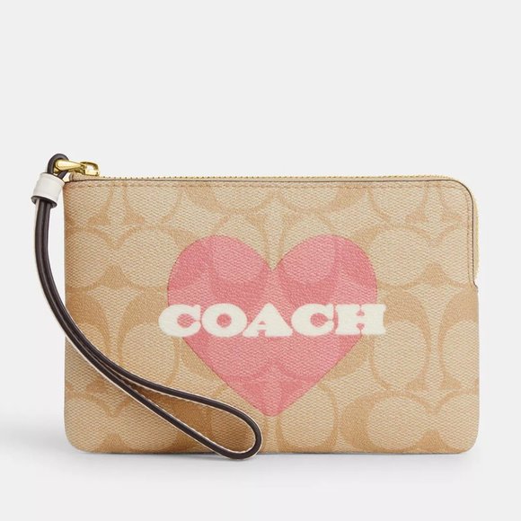 🥰 Corner Zip Wristlet In Signature Canvas With Heart Print - Picture 3 of 10